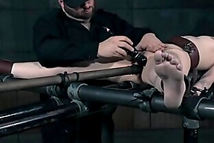 Inverted submissive chastised with caning