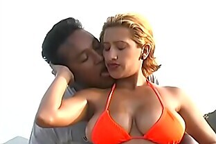 Latin blonde likes to watch sunset on the sea side after hot sex with black fellow