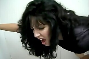 Stud pulls hot MILF Ariel Cassidine's hair while he pounds her doggy style in the loo