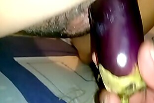Fucking my wife with a big eggplant