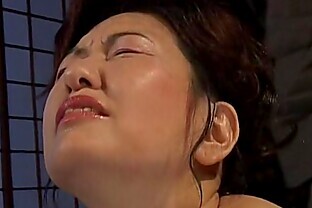 Busty Japanese chick in hot wax BDSM action
